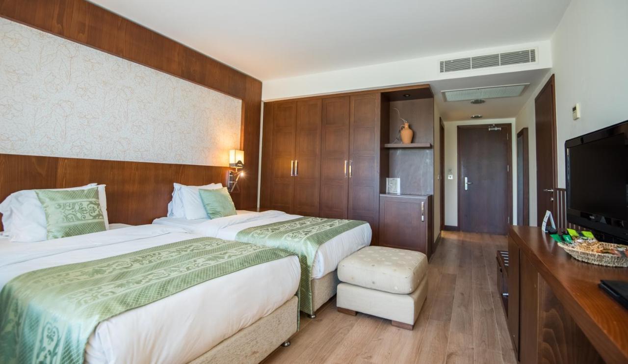 โคลิเนียม กอล์ฟแอนด์บีช รีสอร์ต Hotel Agios Georgios  ภายนอก รูปภาพ