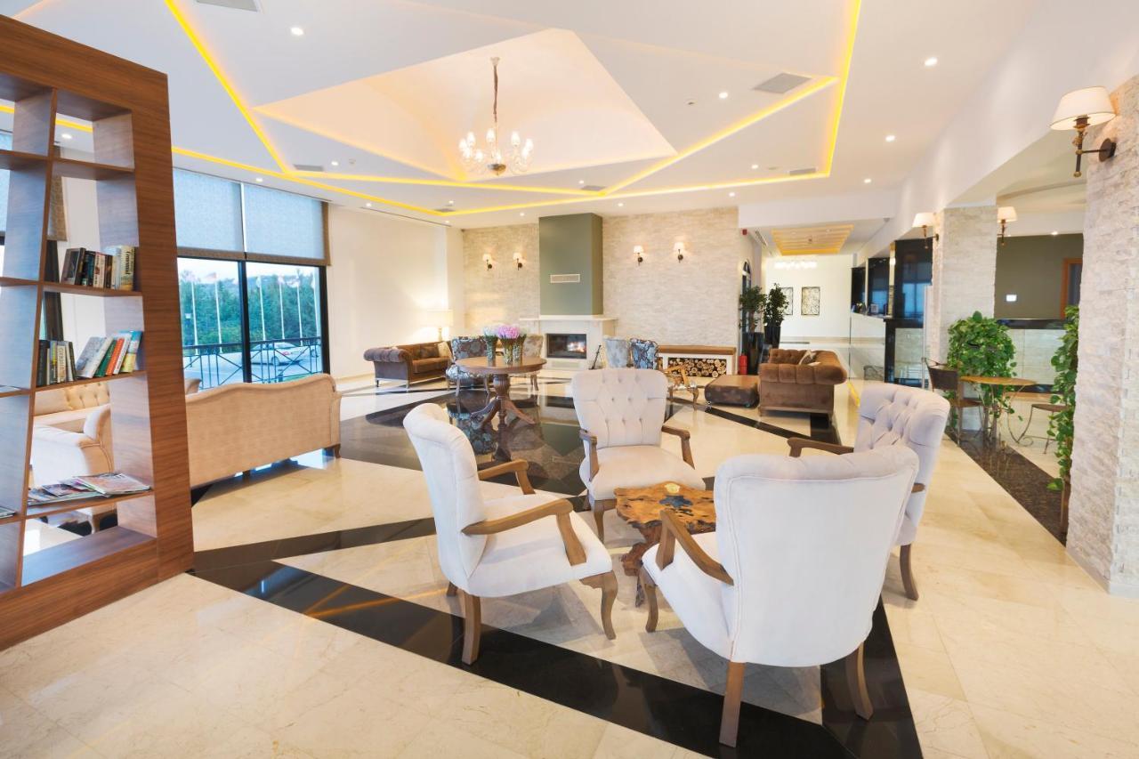 โคลิเนียม กอล์ฟแอนด์บีช รีสอร์ต Hotel Agios Georgios  ภายนอก รูปภาพ