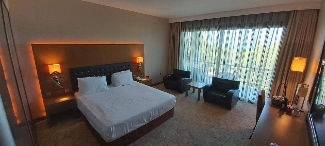 โคลิเนียม กอล์ฟแอนด์บีช รีสอร์ต Hotel Agios Georgios  ภายนอก รูปภาพ