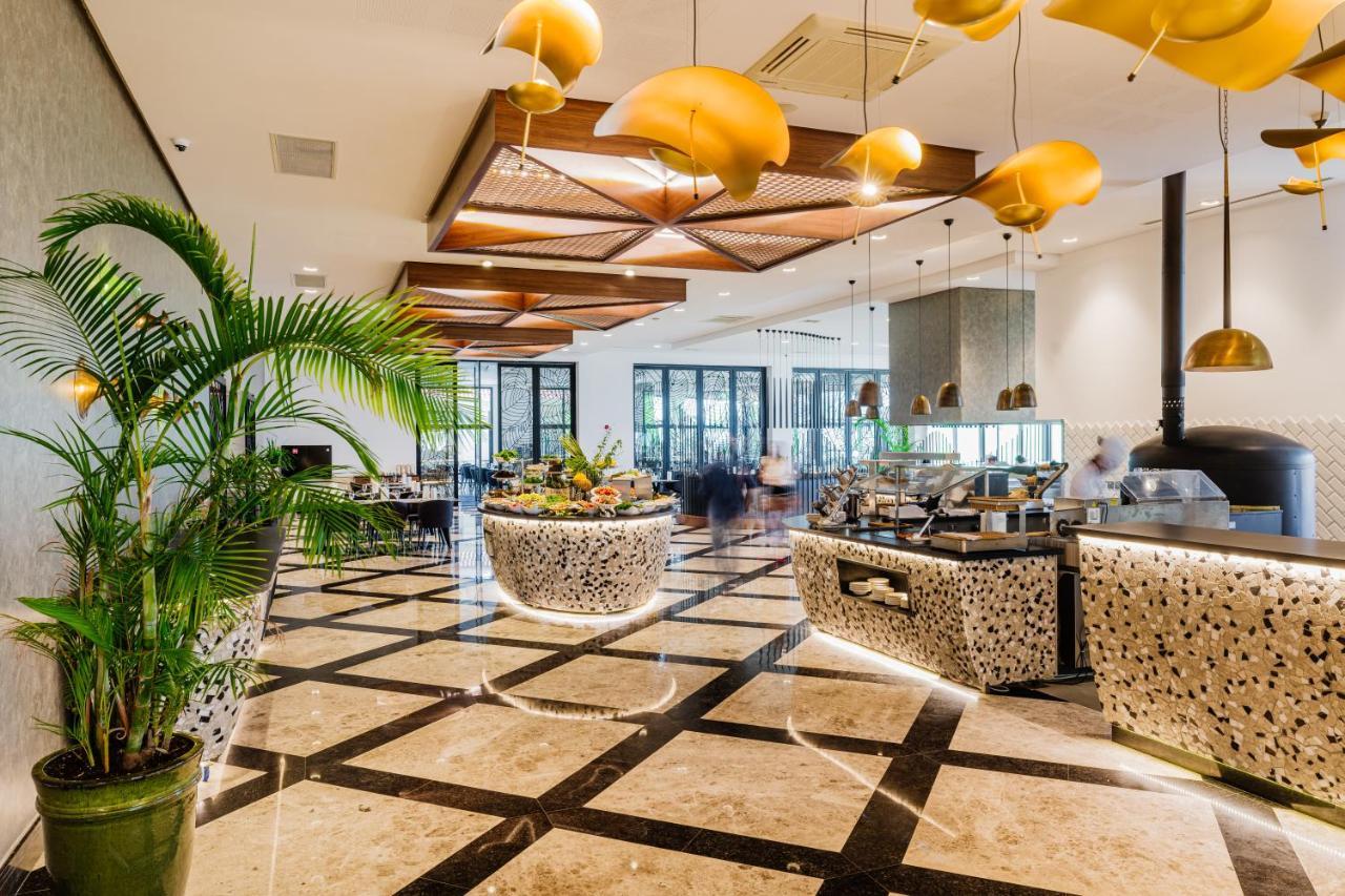 โคลิเนียม กอล์ฟแอนด์บีช รีสอร์ต Hotel Agios Georgios  ภายนอก รูปภาพ